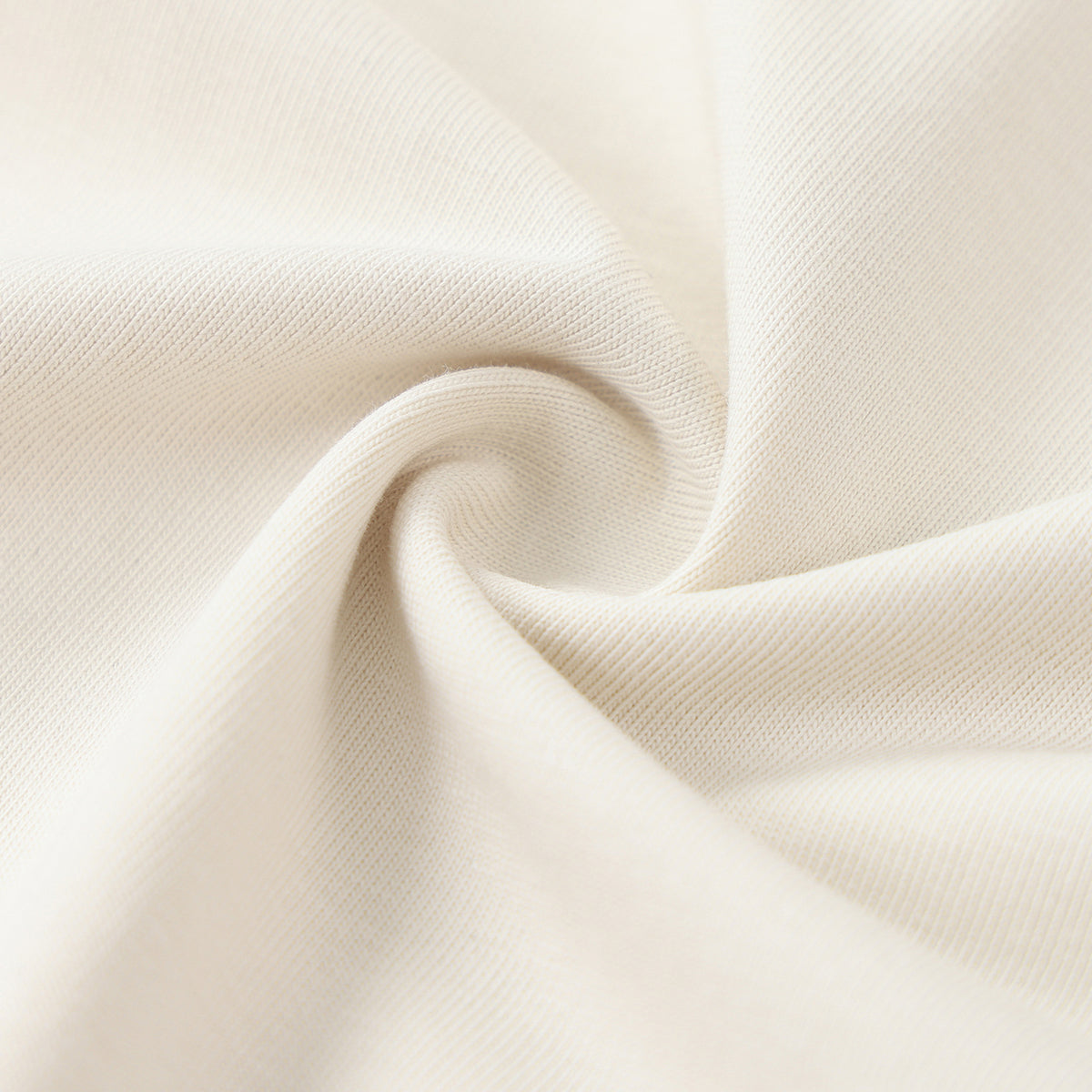 Close-up of beige fabric with a subtle texture